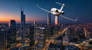 Business jet flying over modern city - GIF.jpg