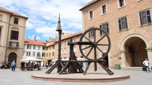 wheel-of-torture-in-a-central-square-of-medieval-city.jpg