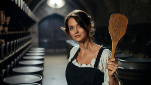 beautiful-woman-with-a-wooden-spatula-in-her-right-hand-.jpg