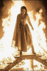 Beautiful medieval woman stands on the burning scaffold - 5.jpg