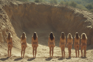 Six beautiful naked woman stand facing the large freshly dug grave - 2.jpg