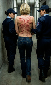 Whipped in prison topless.png