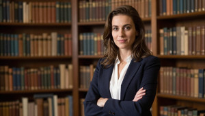 Beautiful female literary agent inside medieval library - Z.jpg